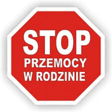 Znak STOP PRZEMOCY W RODZINIE. Biały napis na czerwonym tle. Znak w kształcie ośmiokąta.